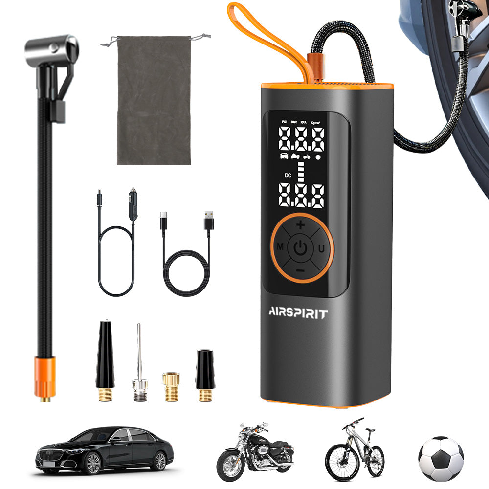An AIRSPIRIT portable air compressor with an LCD display, digital readout, and various inflation tips attached or included. It appears to be black with orange accents, and there is a power cord, USB cable, and a flashlight mounted on the top.